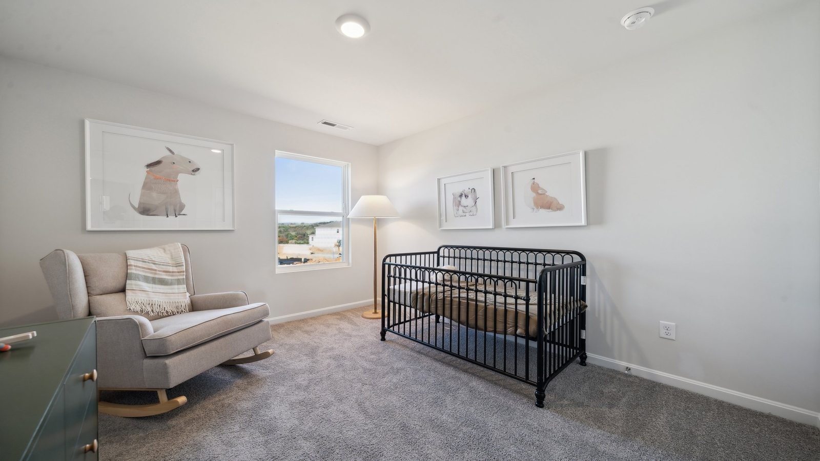 Bright and open owner's bedroom in Arbors at Farms of New Kent overlooking the backyard, en-suite bathroom, Walk-in closet.