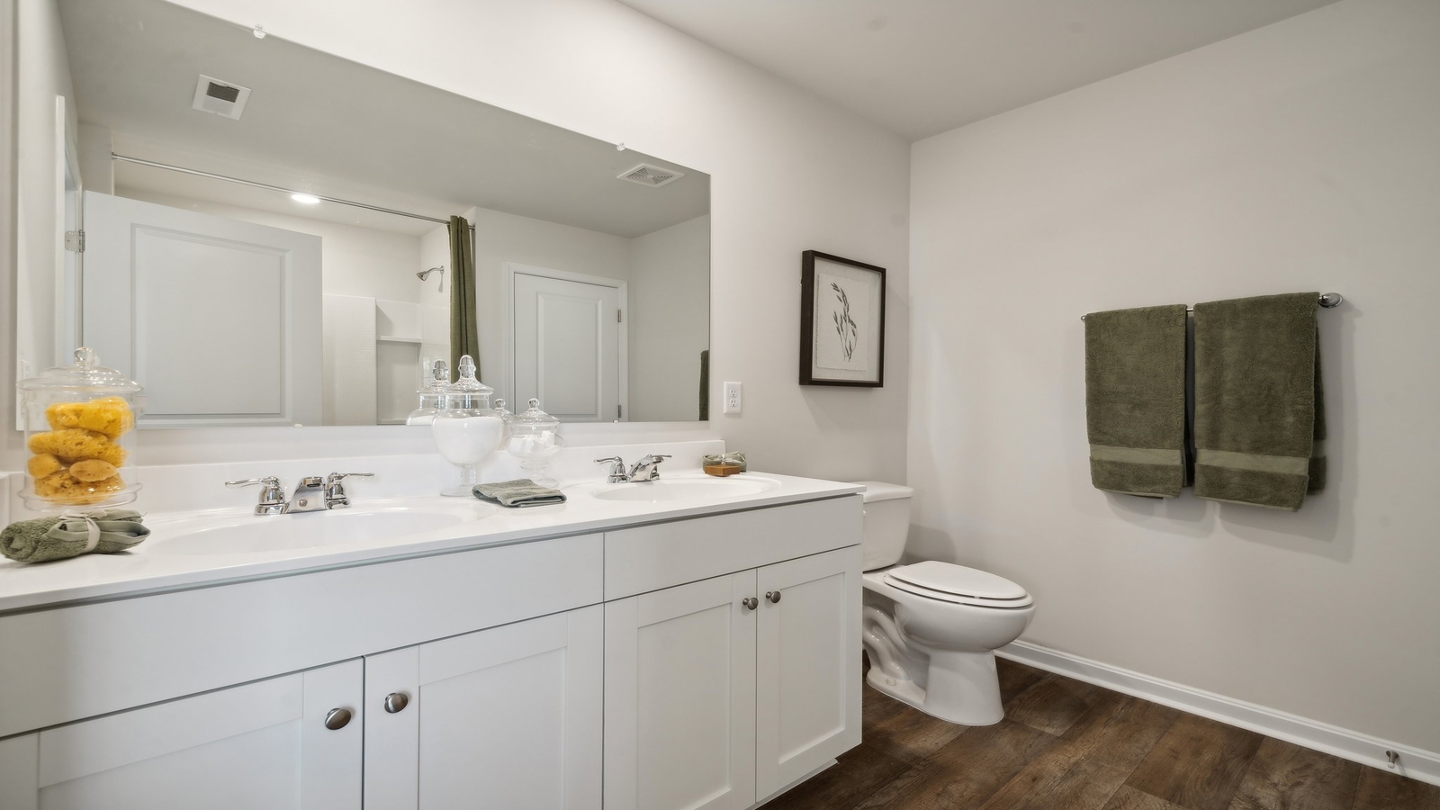 Owner's En-suite bath adds practical vanity space, spa-inspired design and access to the owner’s bedroom and Walk-in closet