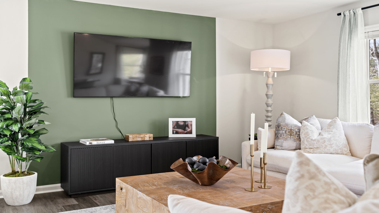 New Home living room includes Modern Design elements, and functional wall space for flexible layouts