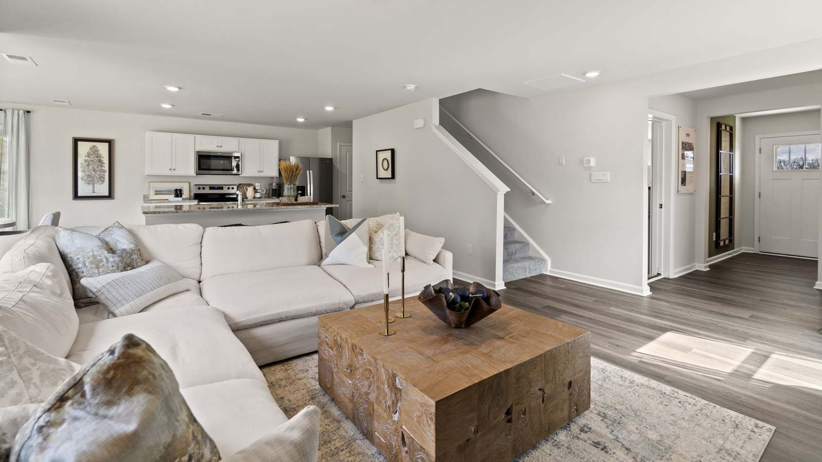 New Home living room includes Modern Design elements, and functional wall space for flexible layouts