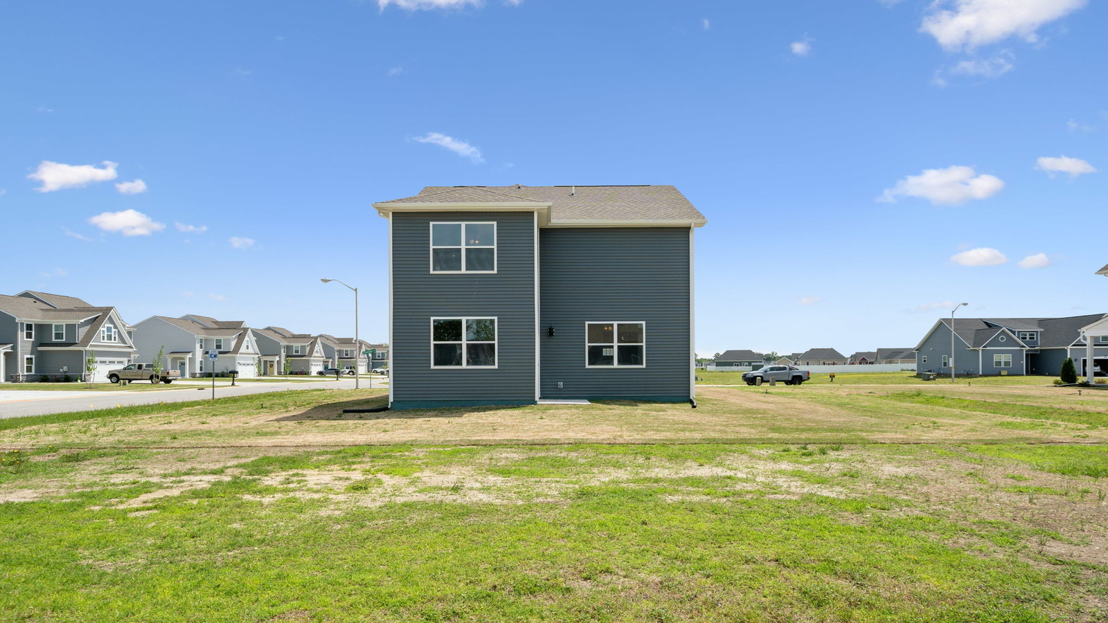 Functional backyard design with in D.R. Horton New Build Home located in a planned community