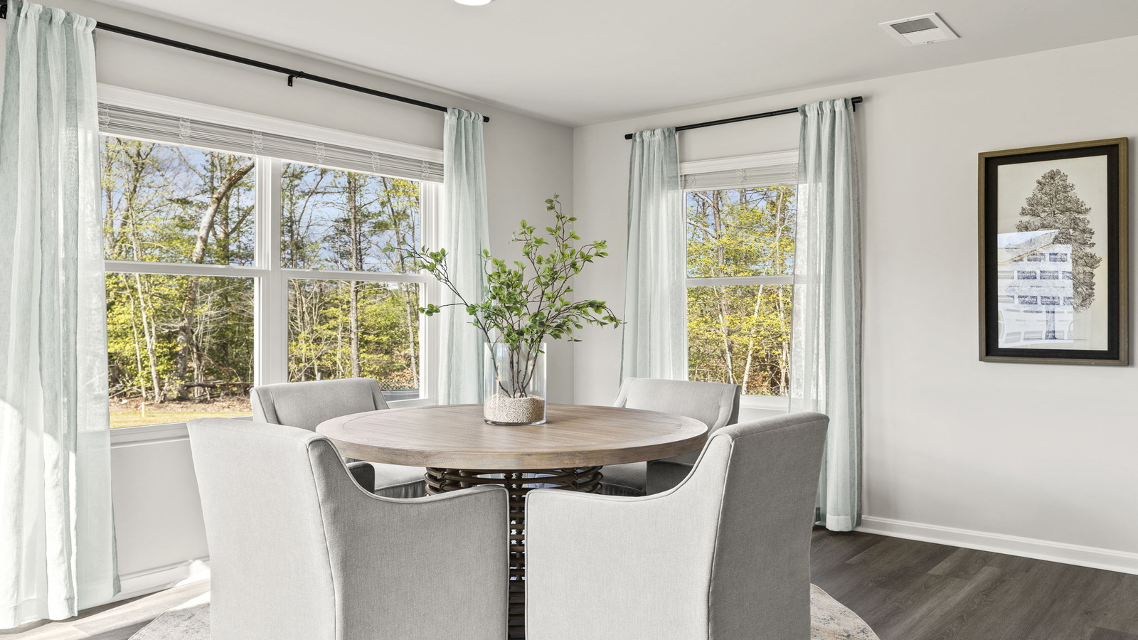 Our modern living room design offers backyard visibility, kitchen and dining connectivity