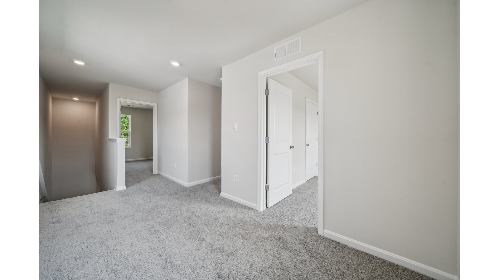 Loft +  Bedroom upstairs layout includes access to open sightlines, easy access to shared spaces Arbors at Farms of New Kent