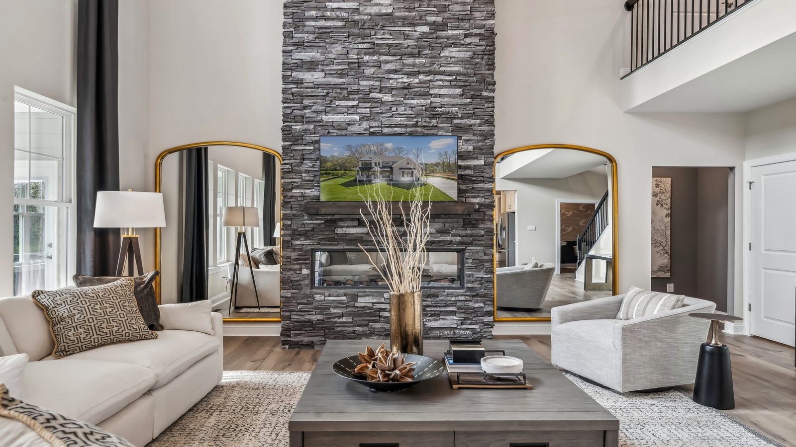 Grand two-story living space off the front foyer, electric fireplace in Red Oaks, fresh open design