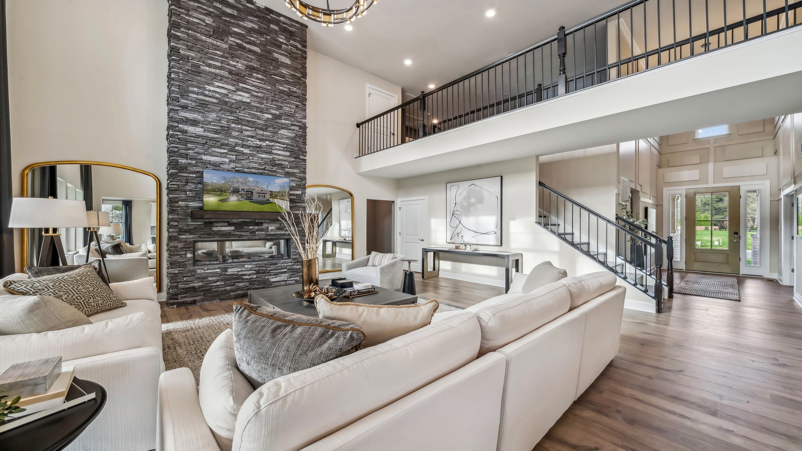 Open and spacious living room near entry, Red Oaks with electric fireplace with two-story ceilings