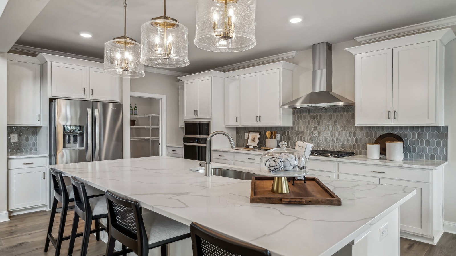 Central kitchen island with seating, crafted to anchor the home, pantry, prep zones, perfect for entertaining and everyday gathering
