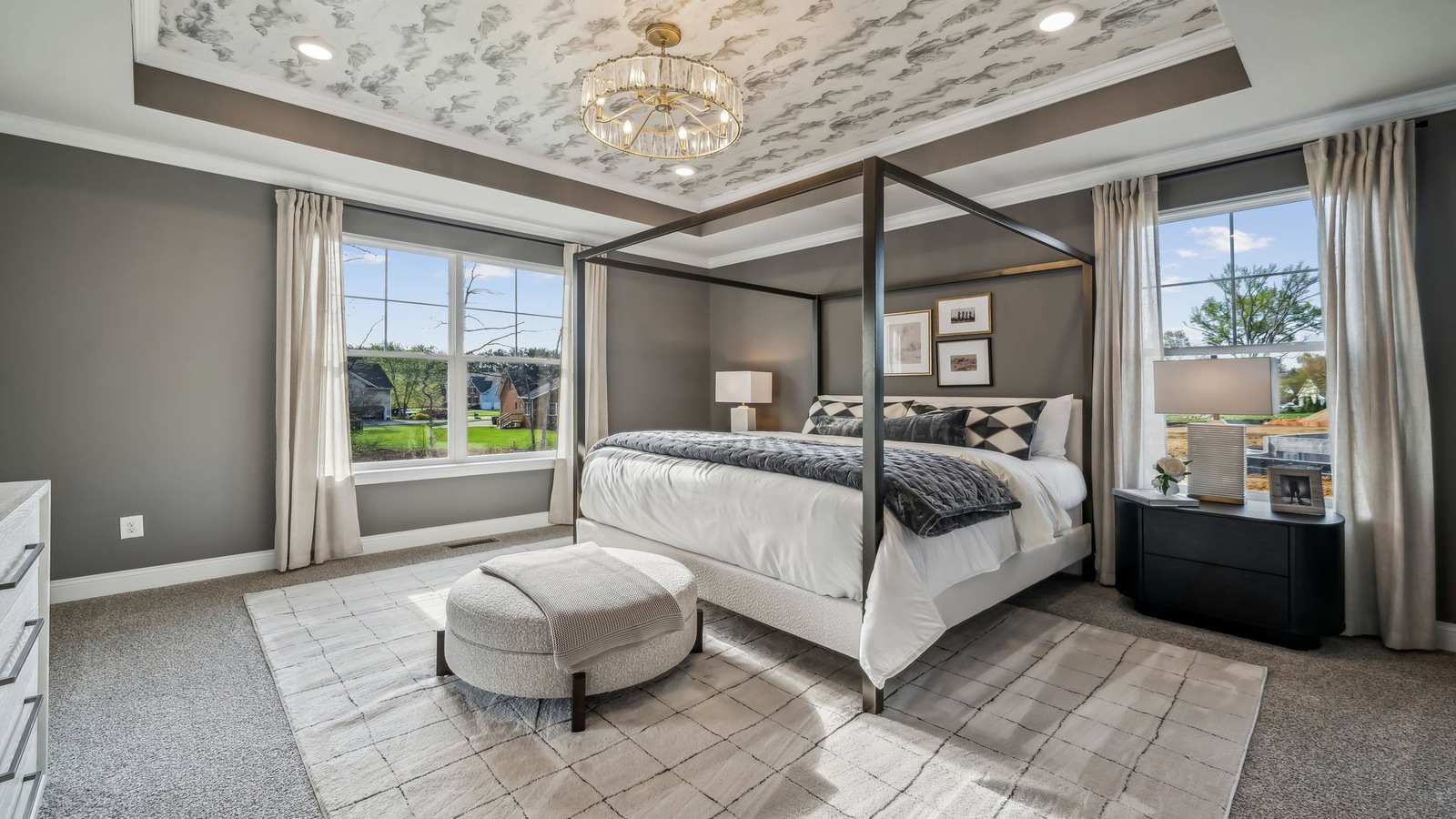 Owner’s suite offers natural window light, spa-inspired ensuite bathroom, backyard view, walk-in closet for everyday style