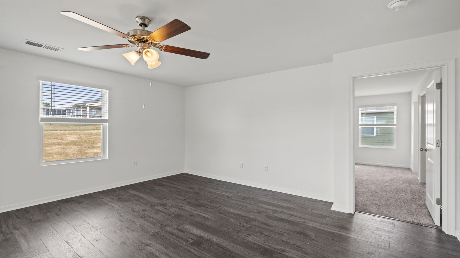 Dining room in Chappell Creek new home showcases open concept connectivity to main level, kitchen, living areas, front entry