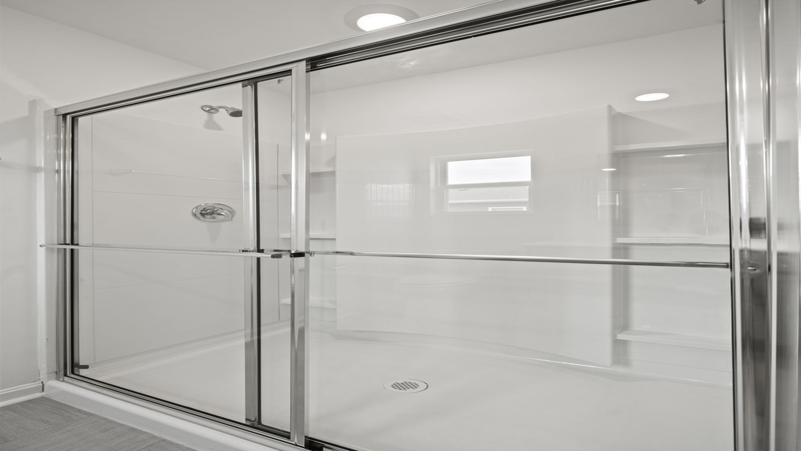 New home showcases a spa-inspired ensuite bathroom, quality stylish upgrades, open designs, shower-tub, and walk-in closet