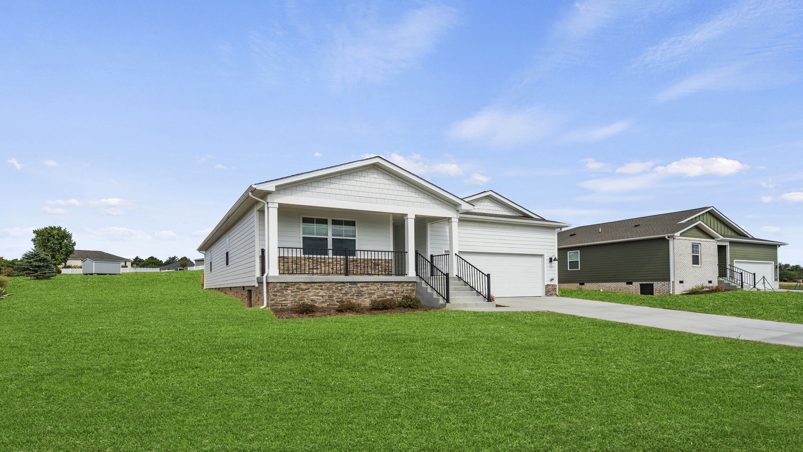 11020 Heron Creek Drive, North Prince George, VA, new home Presented by D.R. Horton with two-car garage, yard, porch