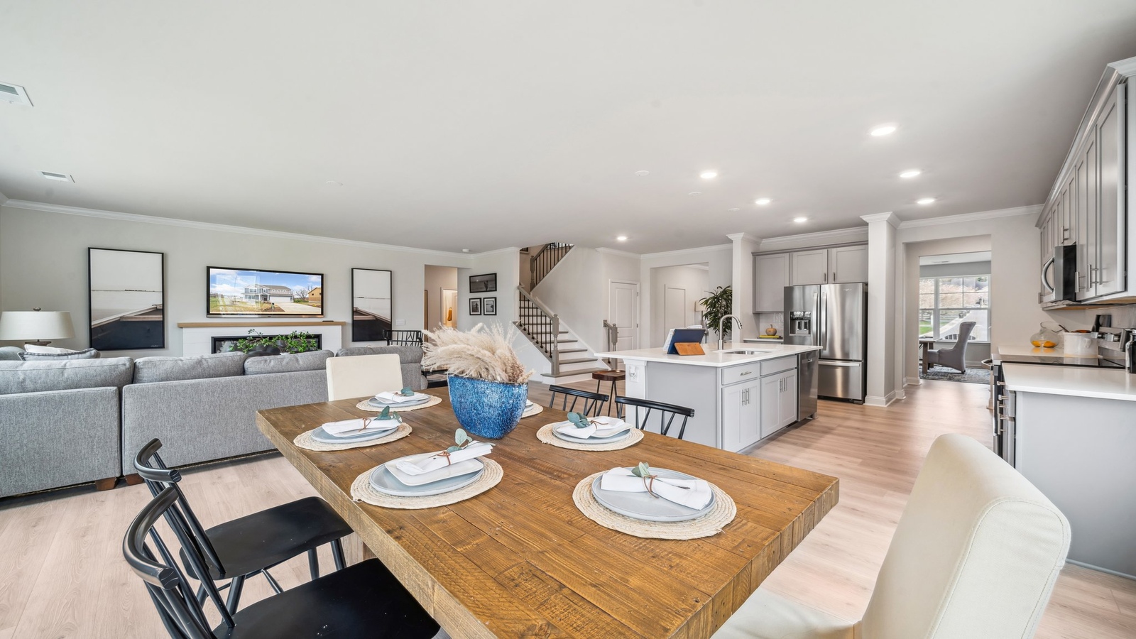 Bright kitchen featuring walk-in pantry, cabinet color selections, and brand-new appliance package