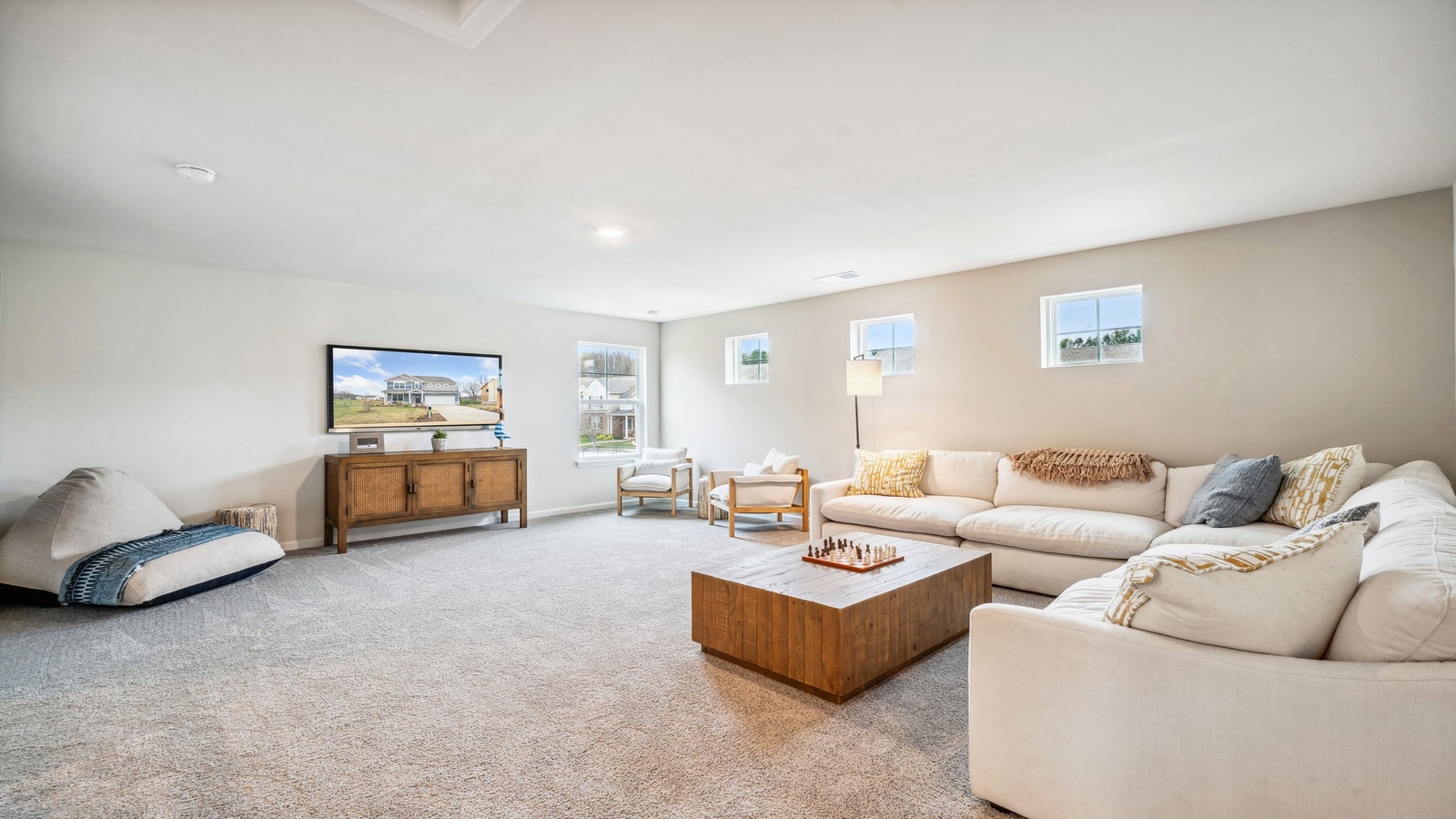 Loft + Secondary Bedroom Open layout upstairs features loft flowing into secondary bedroom, ideal for multipurpose use