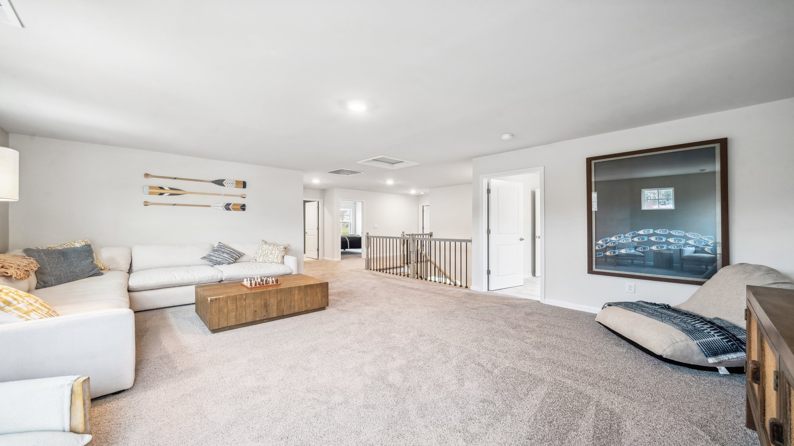 Loft + Secondary Bedroom features versatile loft space outside two secondary bedrooms, maximizing usability and privacy