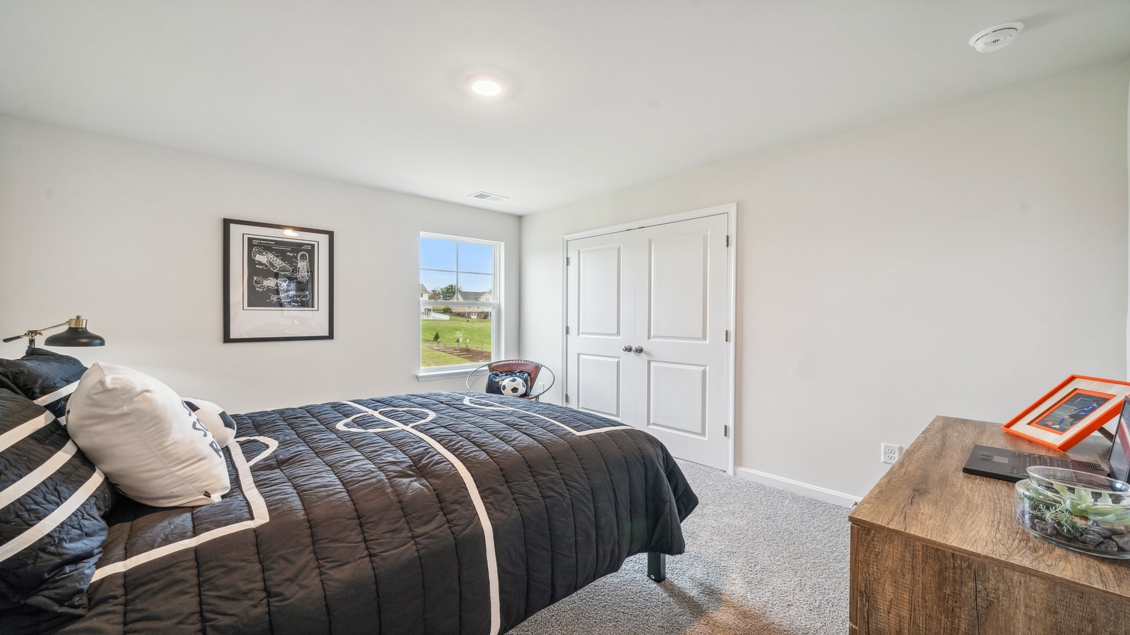 Secondary Bedroom with full closet, ample room design, direct access to shared upstairs spaces Copper Grove at Harpers Mill