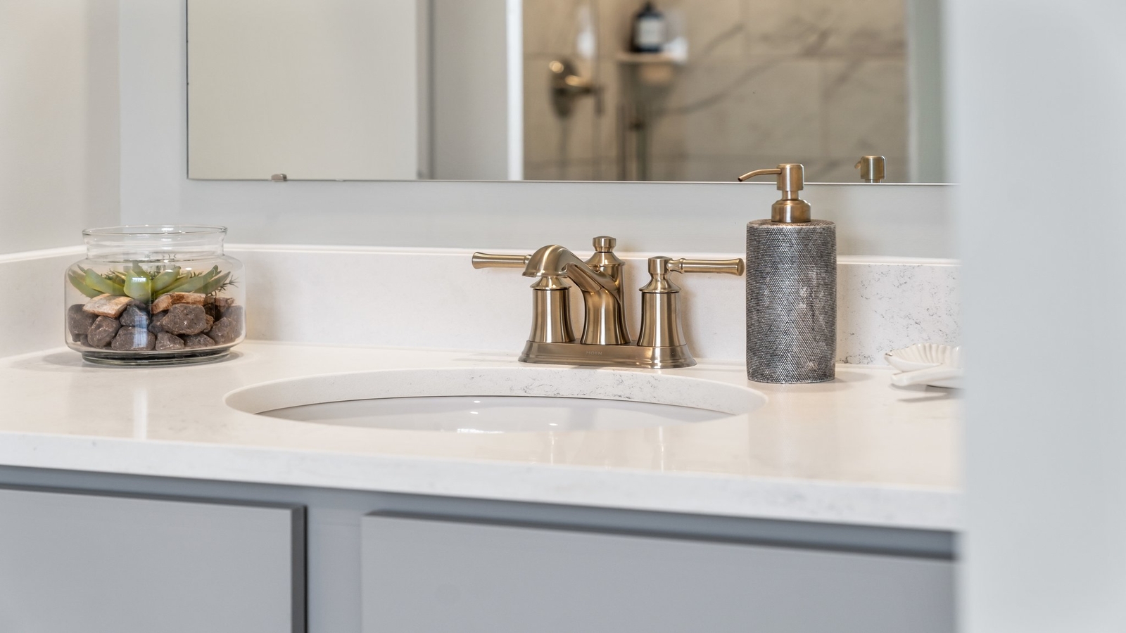 Primary suite at Copper Grove at Harpers Mill corner window views, walk-through access to en suite bathroom, walk-in closet