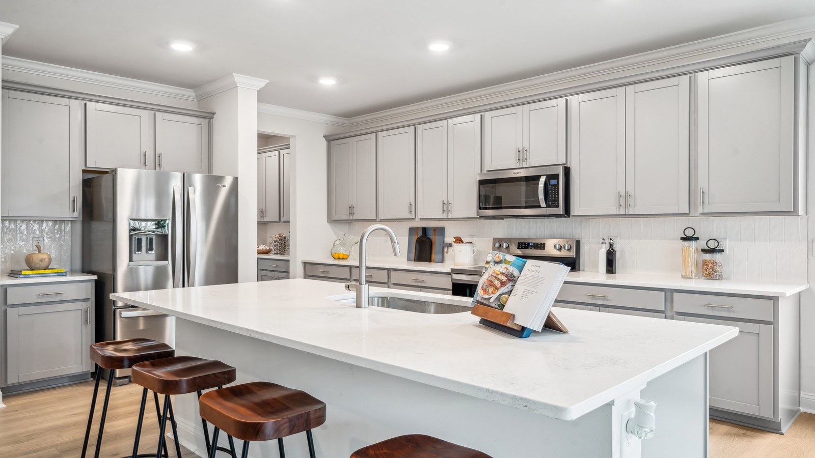 Spacious island ideal for casual dining, cooking prep, ample storage and entertaining in our Modern Design layout