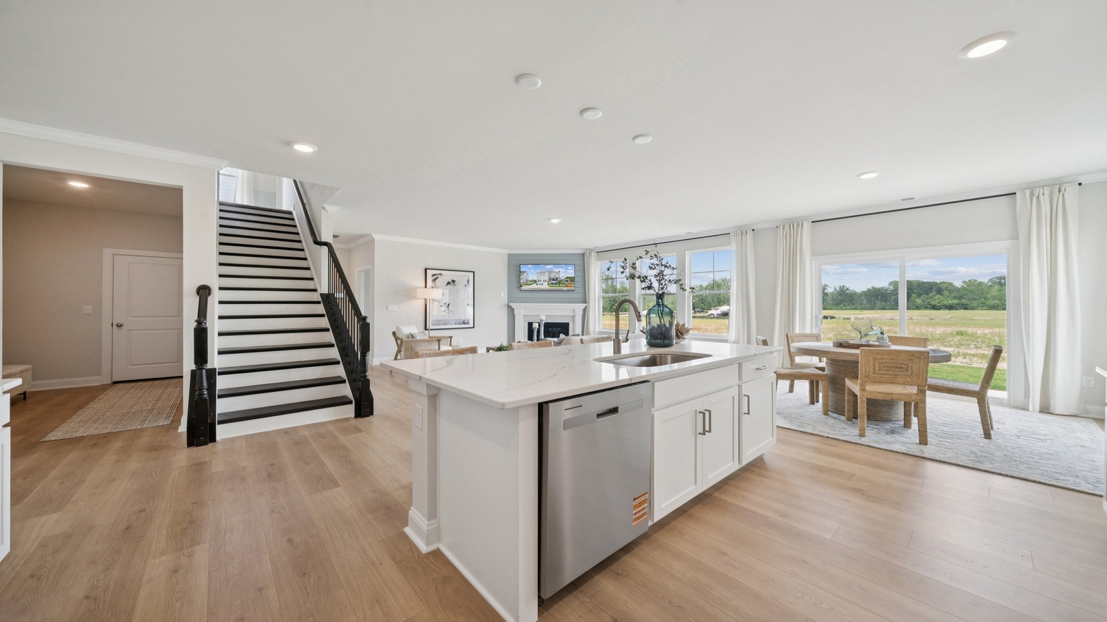 Front-facing dining room off the main entry in new D.R. Horton home at Copper Grove at Harpers Mill