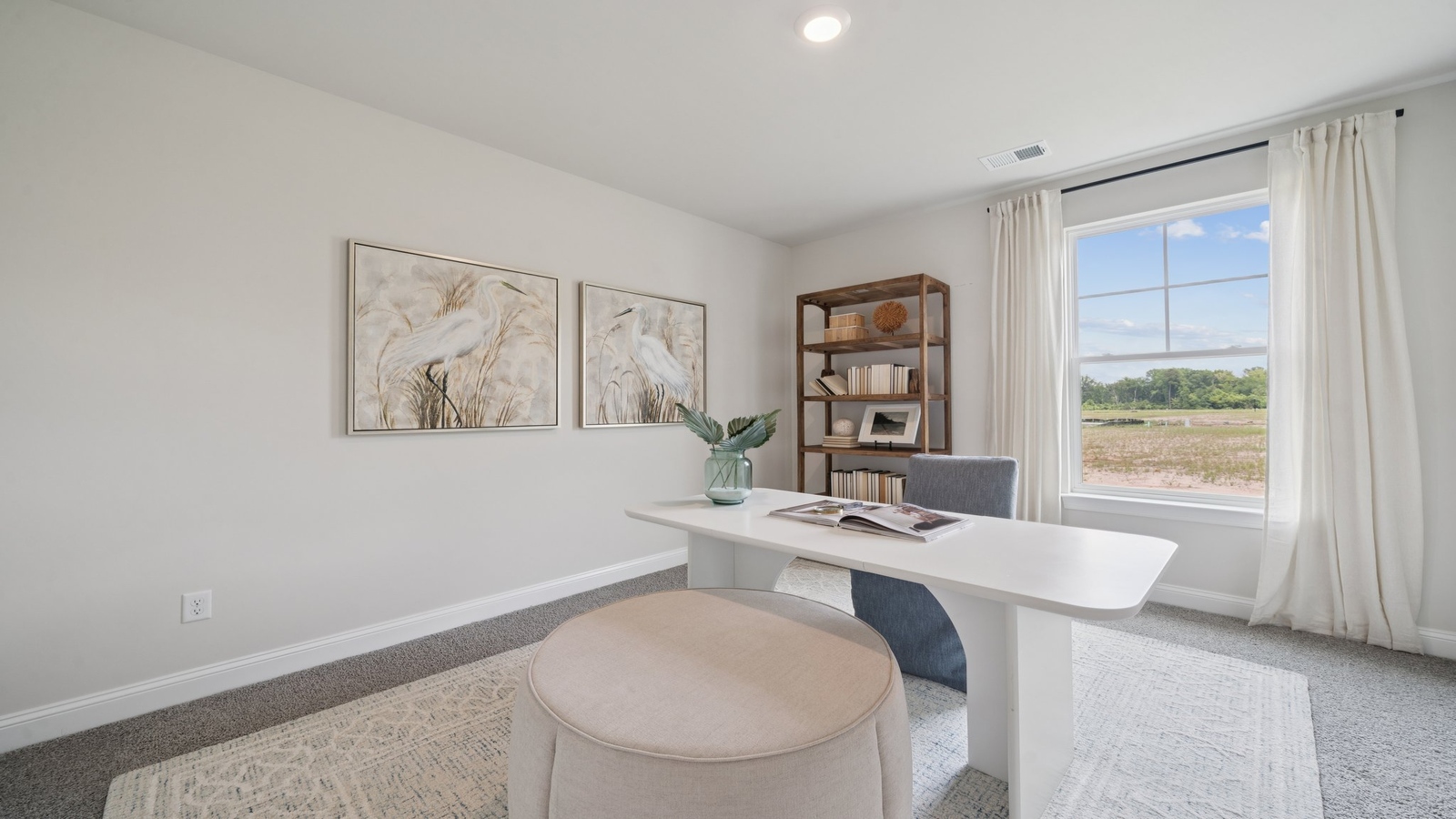 Secondary Bedroom in this home showcases space via single door closet, window and convenient home access Copper Grove at Harpers Mill