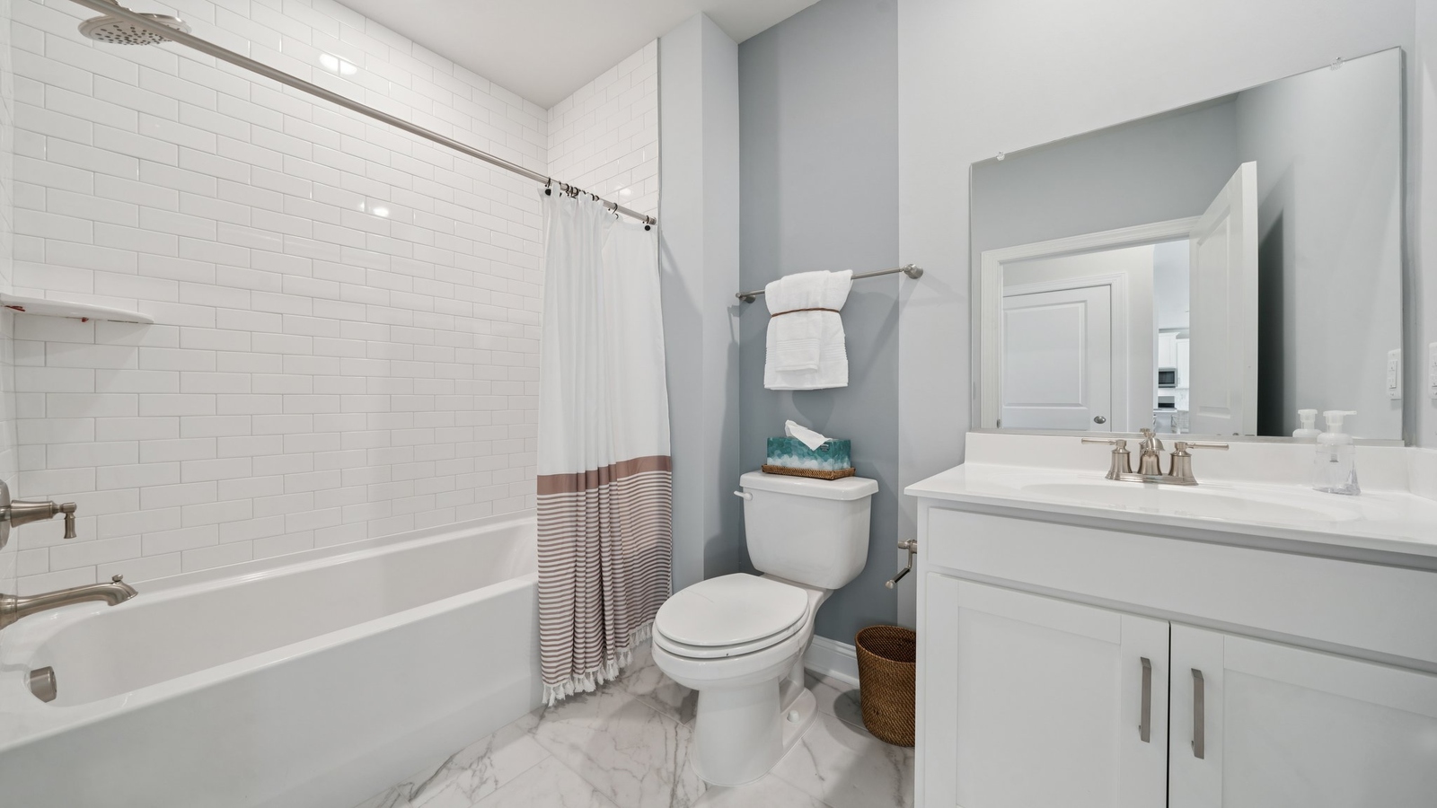 Our new home stylish ensuite design with a step-in shower, LED lighting, full-length vanity, and a walk-in closet