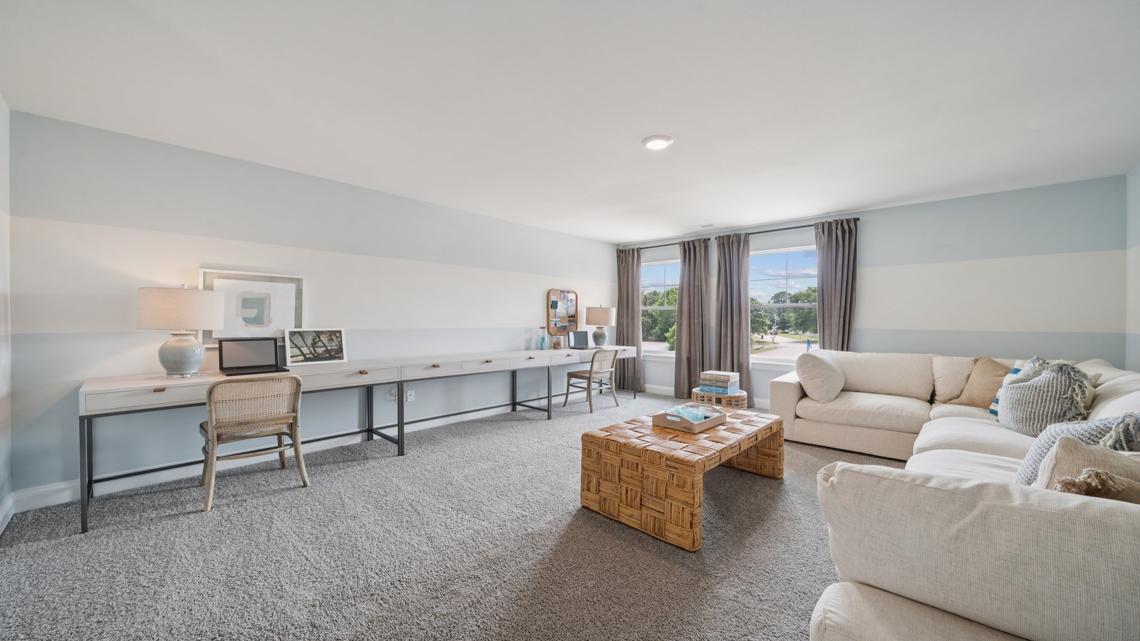 Loft + Secondary Bedroom Open layout upstairs ideal for multipurpose use, flows to bedrooms, bathroom, stair access