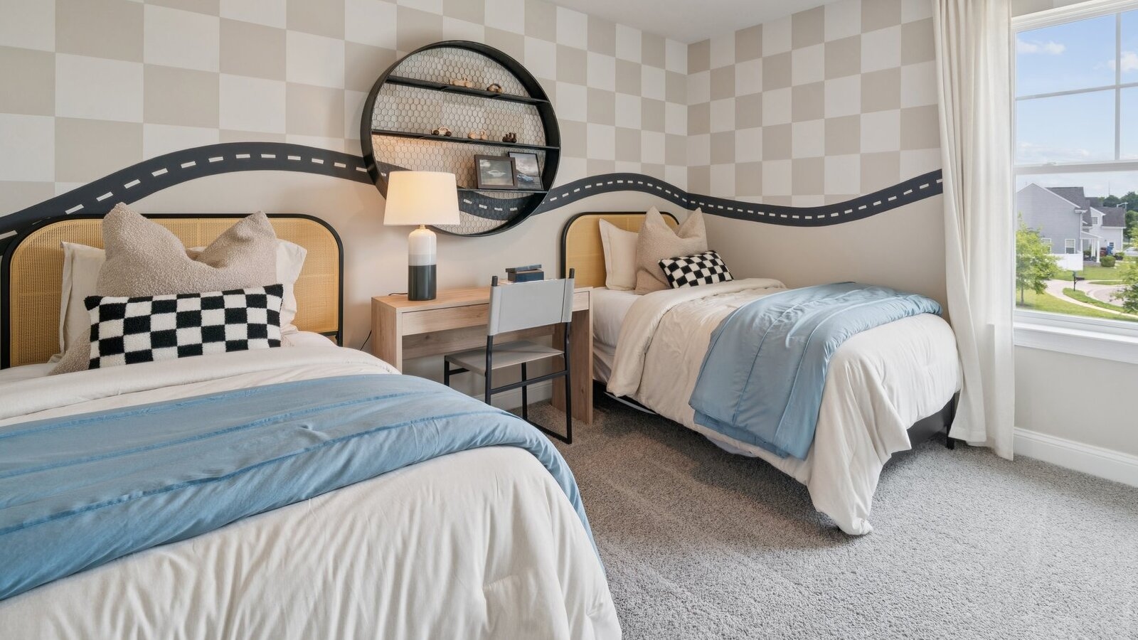 Front-facing flex room in this D.R. Horton home perfect for an kids space-office-library or guest retreat