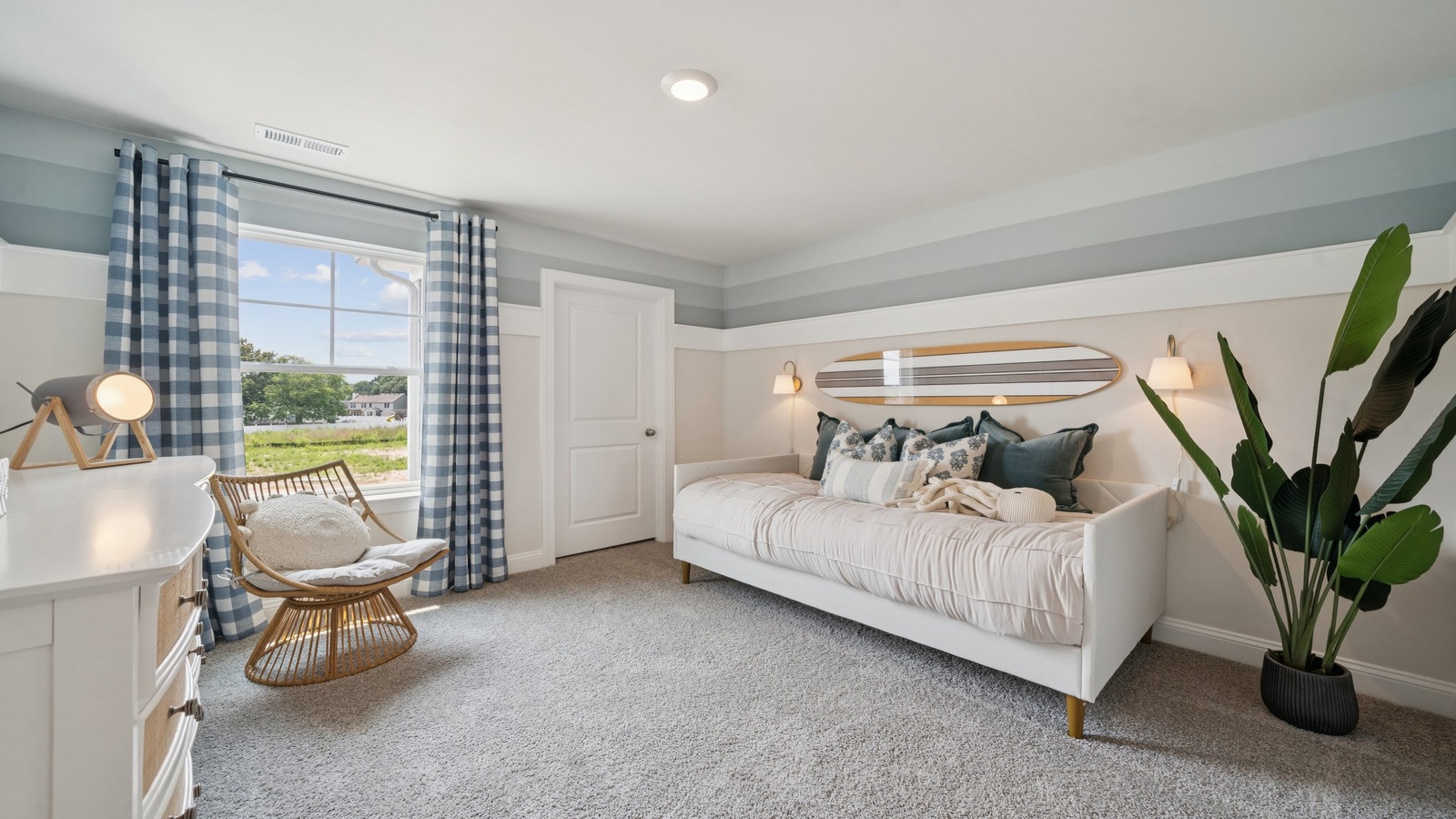 Secondary Bedroom offers well-designed flexibility—ideal for sleeping space, home office, or a fun hobby room