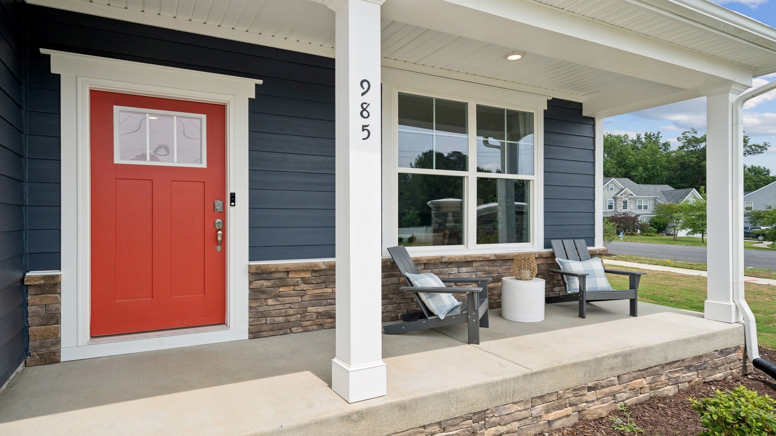 New Home neighborhood in Copper Grove at Harpers Mill , featuring D.R. Horton’s clean architectural lines and Open Concept front porch