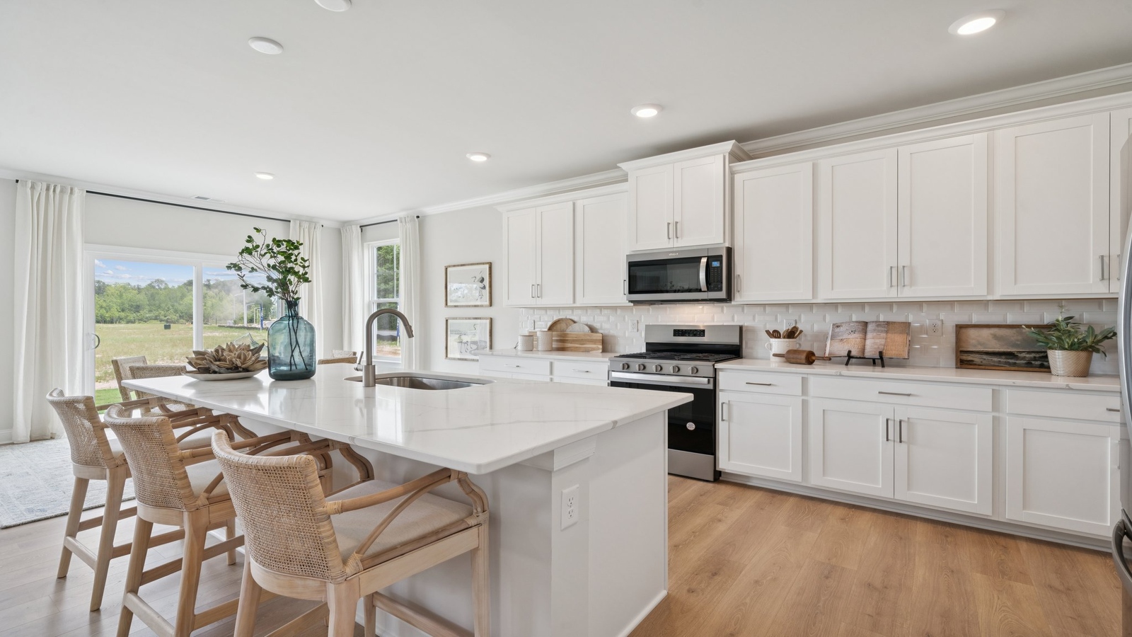 Spacious island ideal for casual dining, cooking prep, ample storage and entertaining in our Modern Design layout