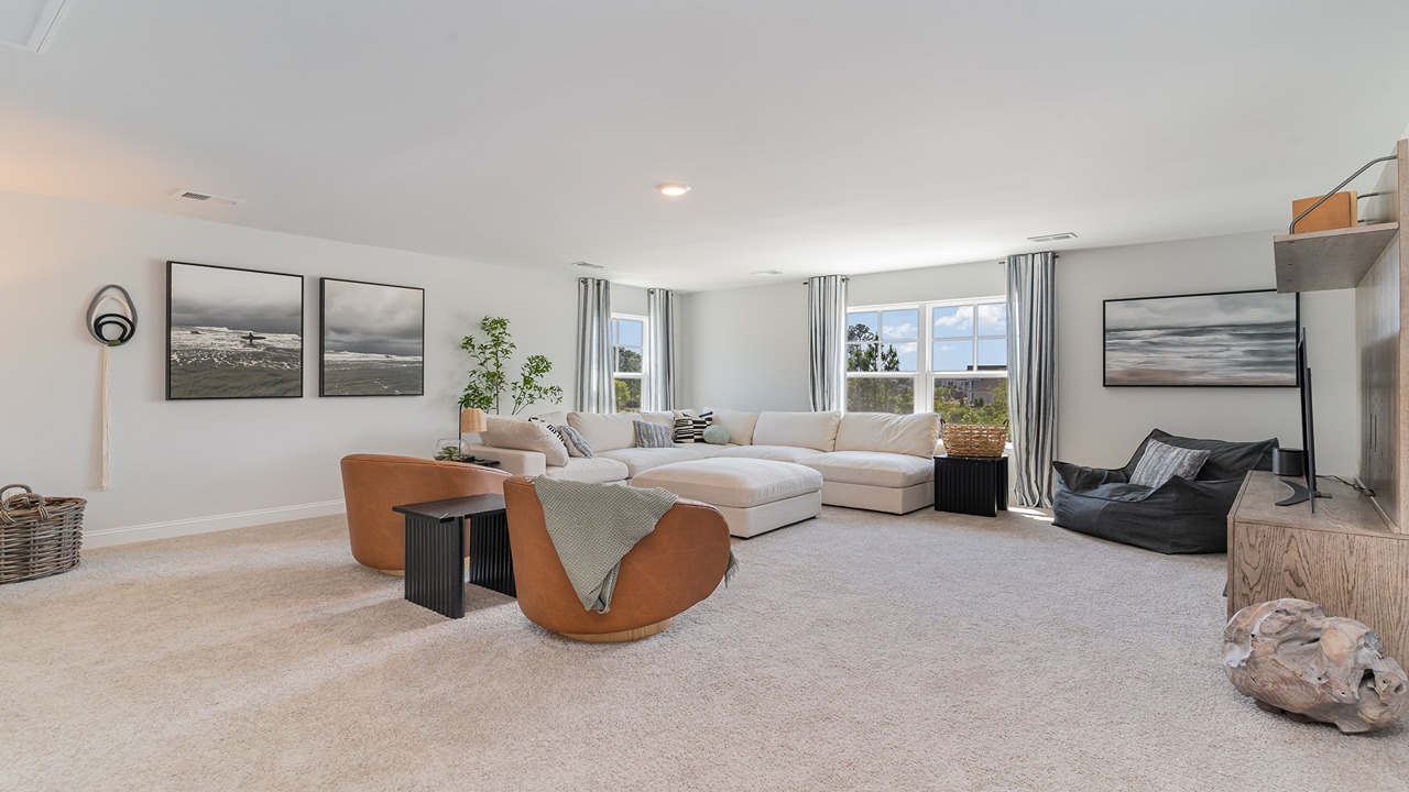 Loft + Secondary Bedroom Open layout upstairs ideal for multipurpose use, flows to bedrooms, bathroom, stair access