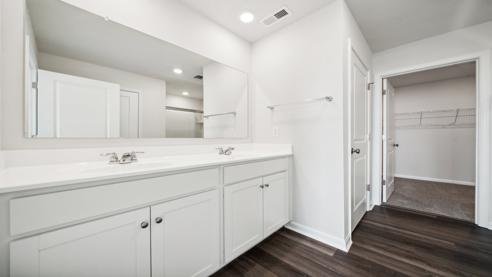 New Home showcases a spa-inspired ensuite bathroom with quality upgrades, open design to shower-tub, and walk-in closet