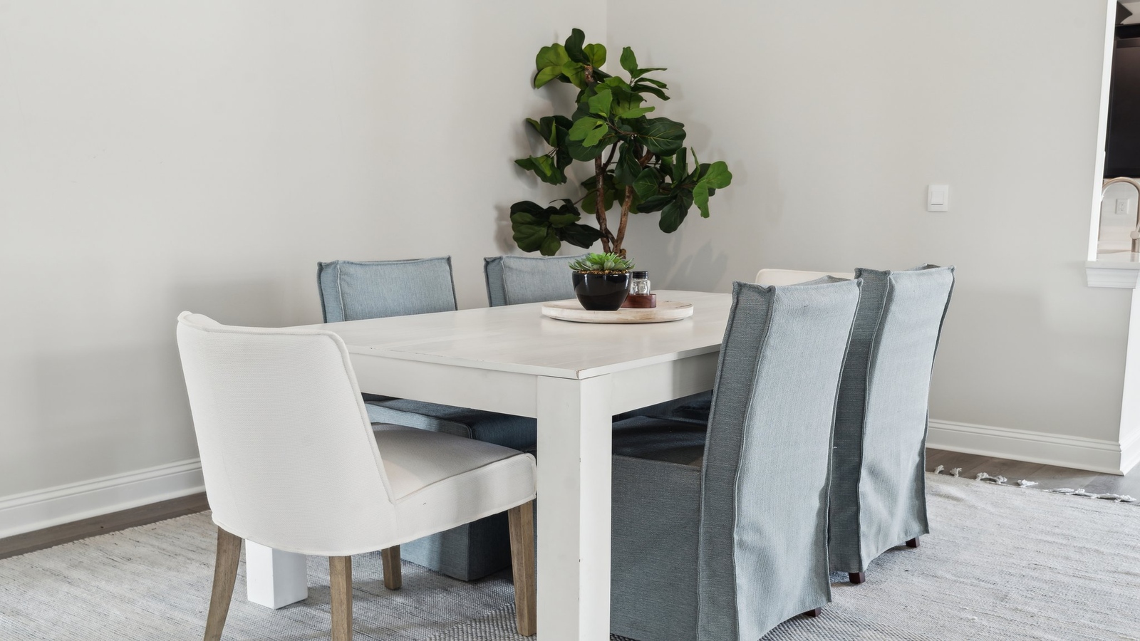Spacious kitchen island with island, seating, pantry, new appliances, and an open layout connected to living area