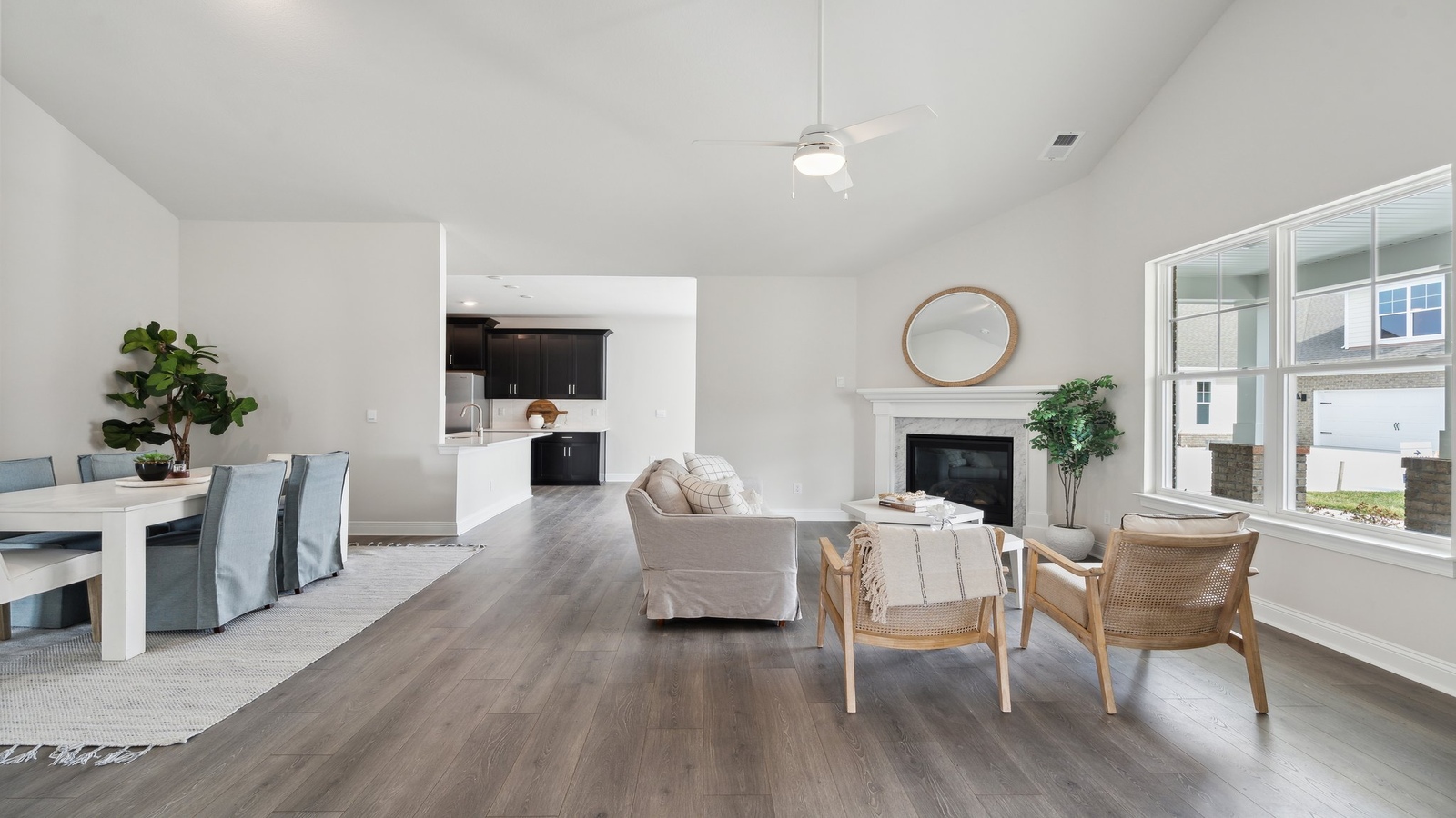Living room with modern design accents, front views, and convenient traffic flow throughout Retreat at Edinburgh Farms