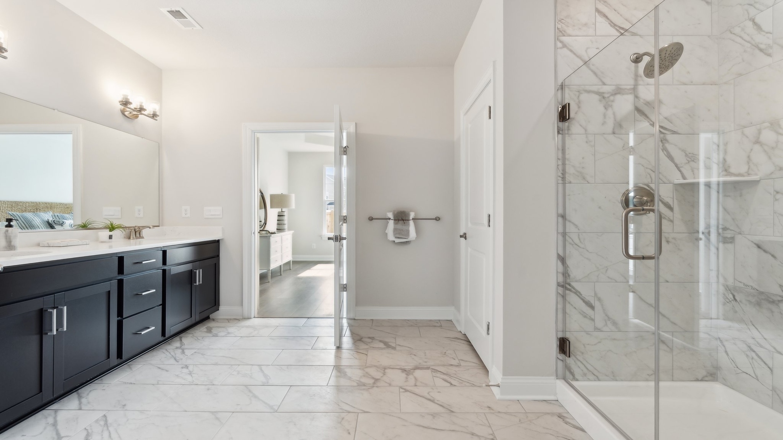 Owner's En-suite bathroom adds stylish appeal, spa-inspired designs and access to the owner’s bedroom and Walk-in closet