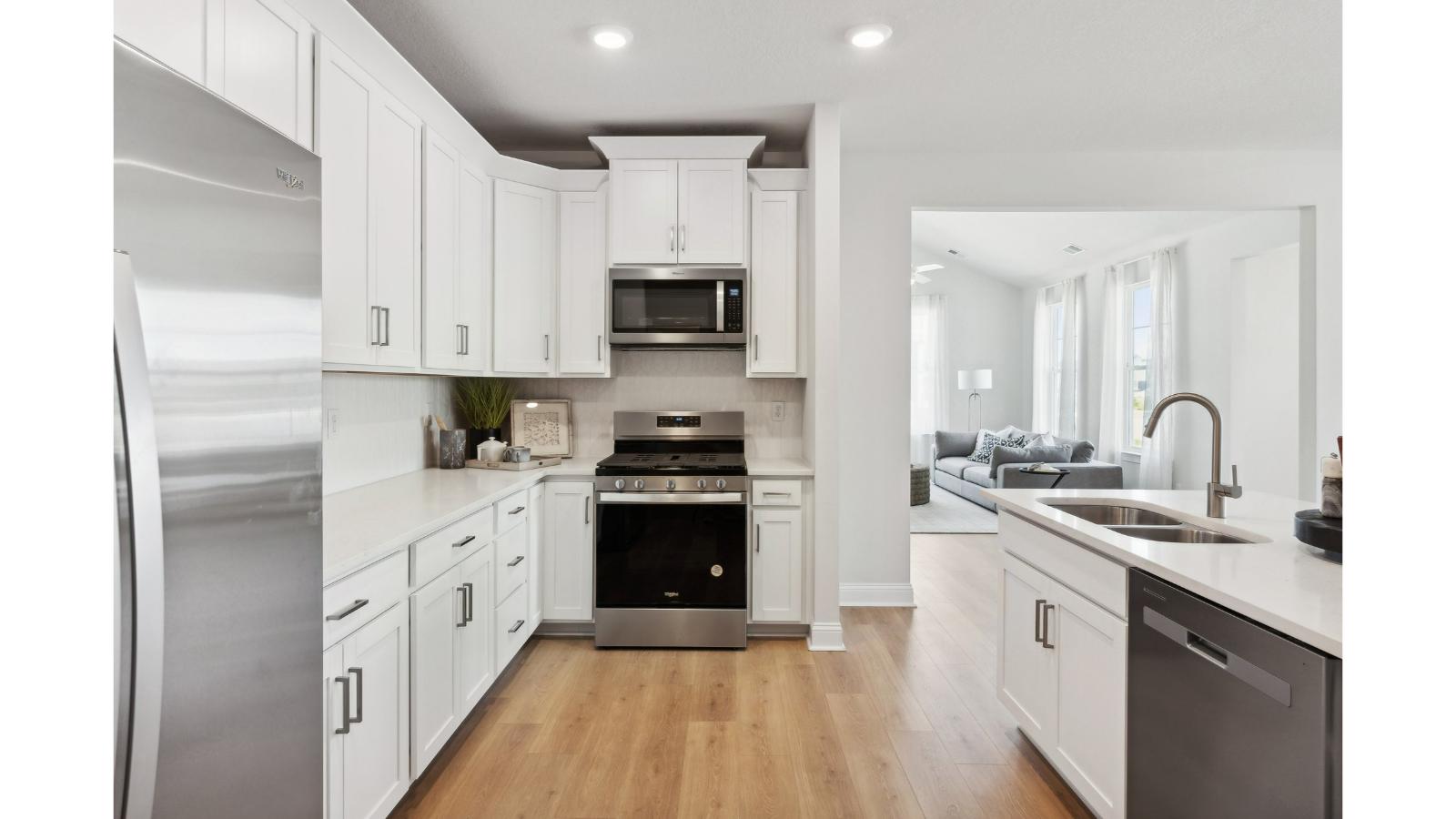 New Home kitchen with island-centric design, pantry, New Appliances, ample cabinet spaces, home connectivity