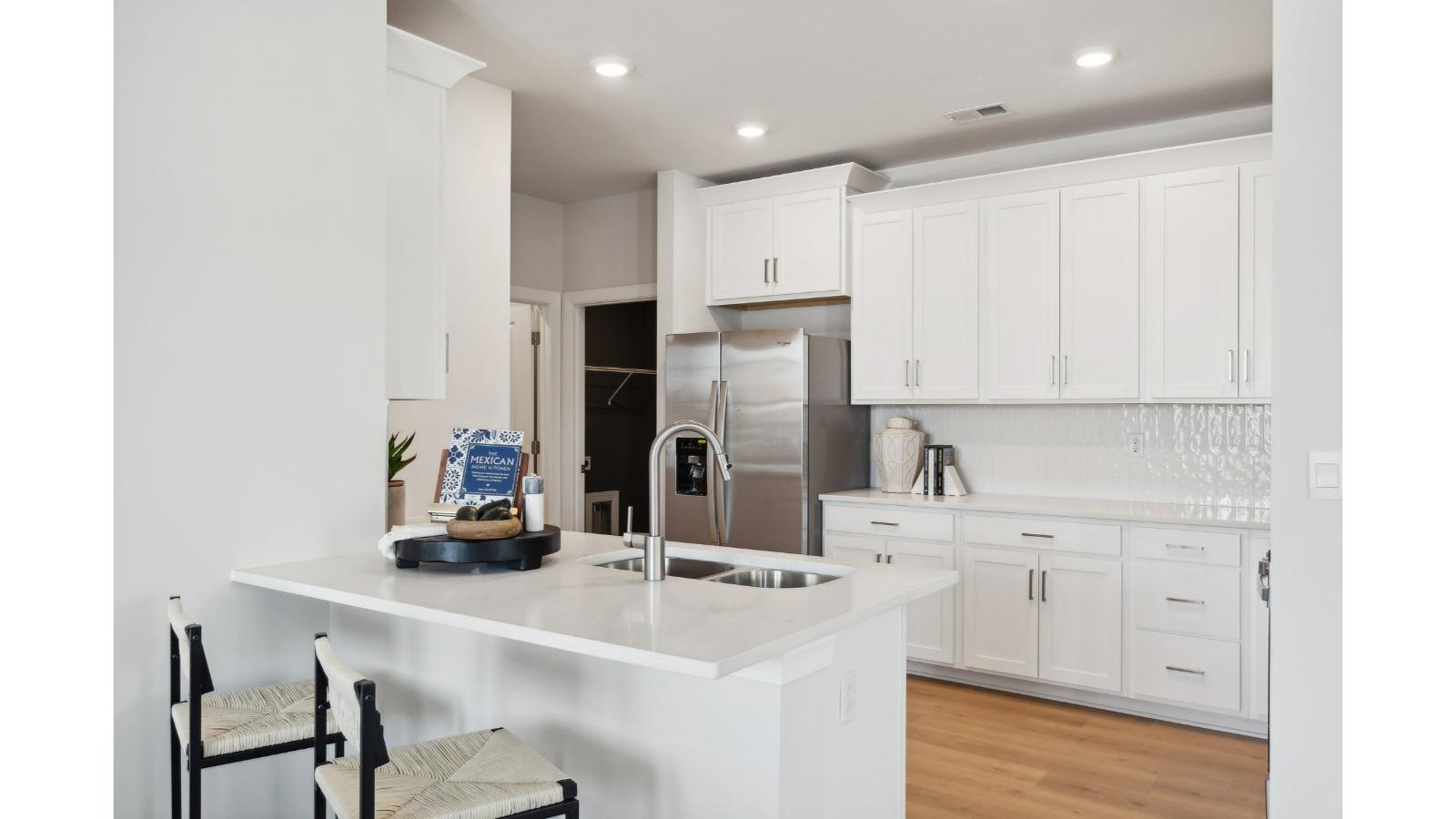 Spacious island ideal for casual dining, cooking prep, ample storage and entertaining in our Modern Design layout