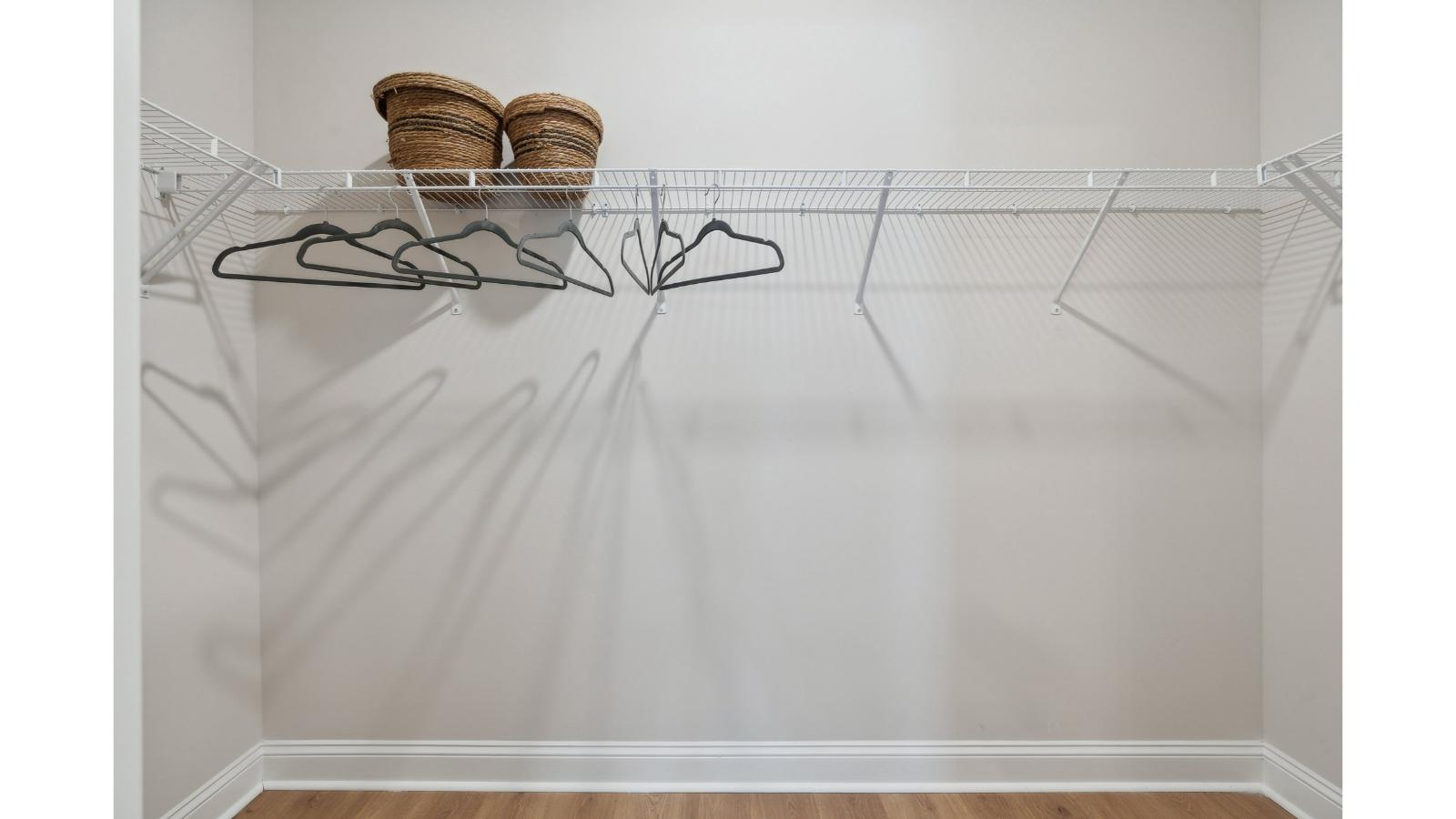 Kitchen pantry in this New Build Home includes floor-to-ceiling shelving, ample storage opportunity