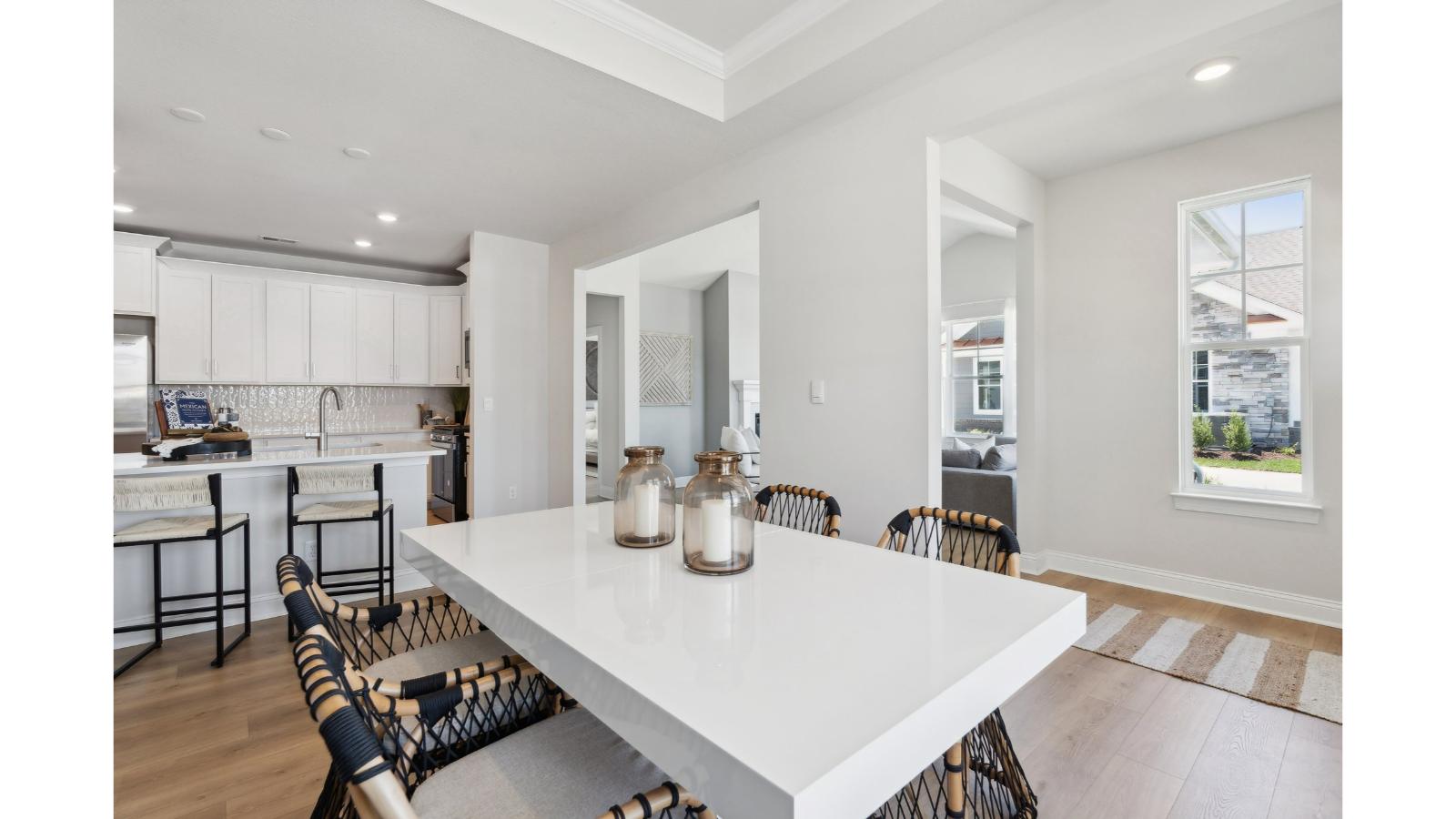 Dining room located at Retreat at Edinburgh Farms home adjacent to kitchen and main living areas