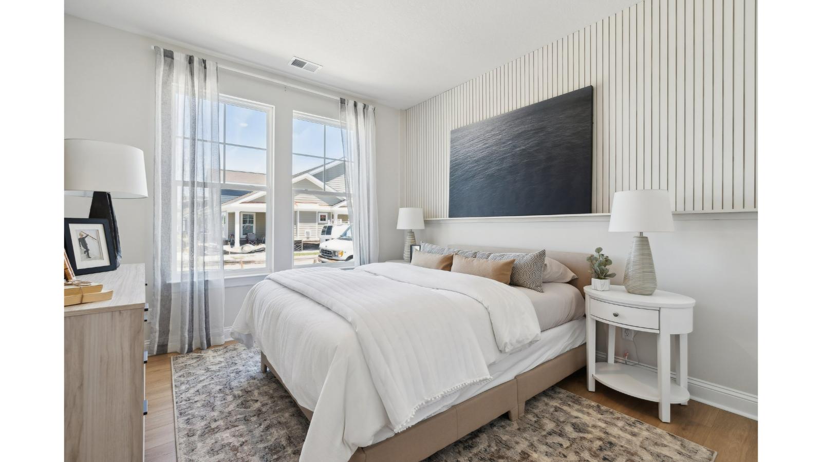 Primary bedroom in this New Home features ample space, double windows, quality carpet, a Walk-in Closet, private En-Suite Bath