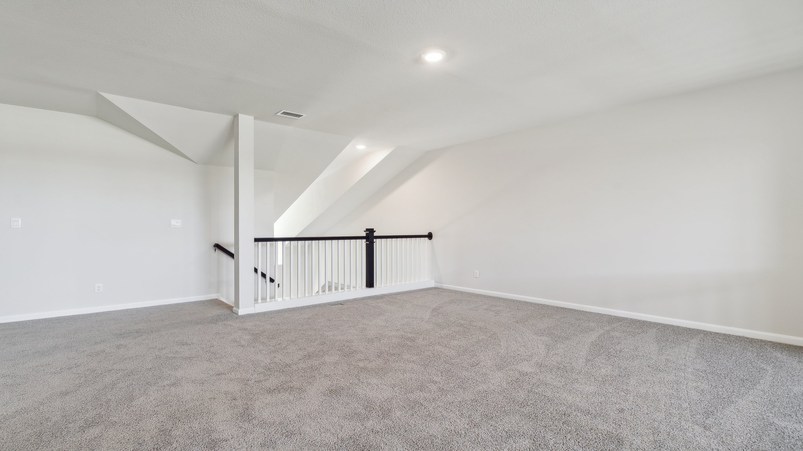 Loft + secondary bedroom with quality carpet, wide landing, stairs, multi-use flowing into secondary bedrooms, bathroom