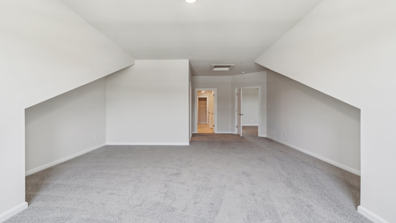Secondary Bedroom showcases space via single door closet, window, convenient home access Retreat at Edinburgh Farms