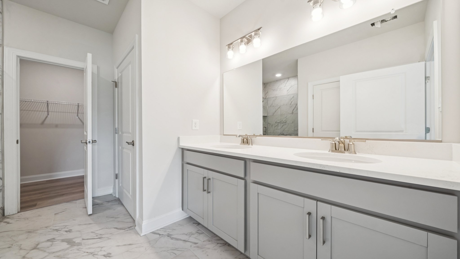 Owner's En-suite bathroom adds stylish appeal, spa-inspired designs and access to the owner’s bedroom and Walk-in closet