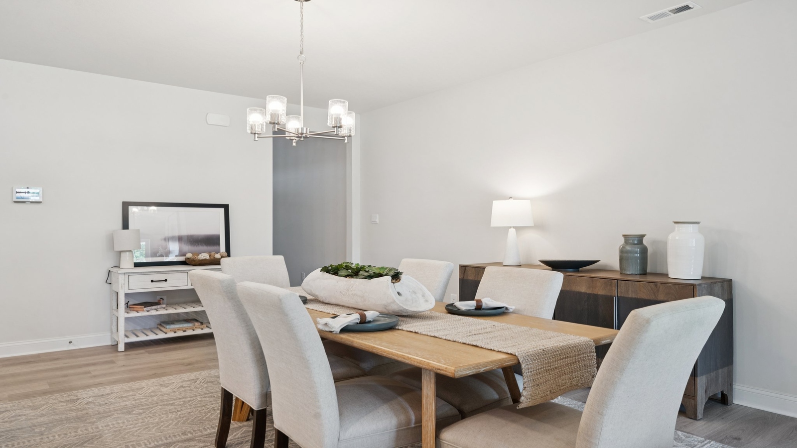 Country Club Villas dining room positioned at the front of the home near the entry