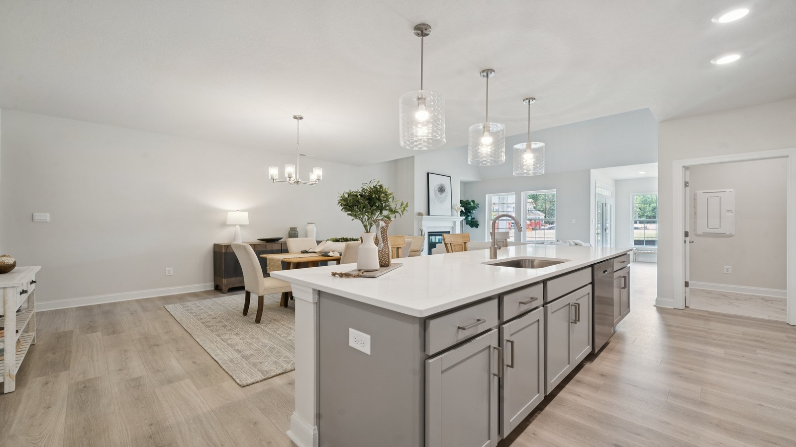 Sleek kitchen design with new appliances, Pantry, cabinet options and island breakfast bar in Country Club Villas