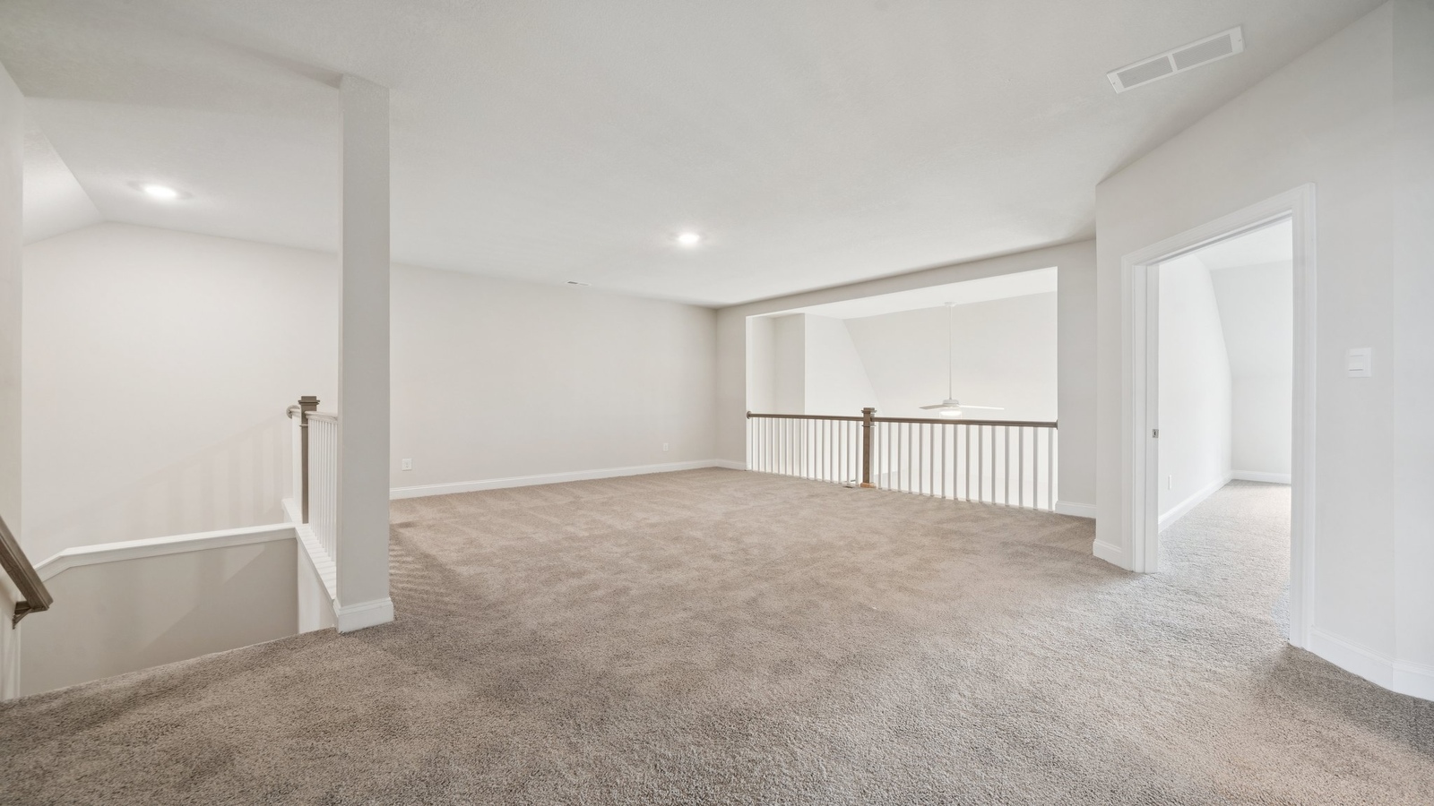 Loft + Secondary Bedroom Loft, adjacent secondary bedrooms-bathrooms provides flexible living spaces