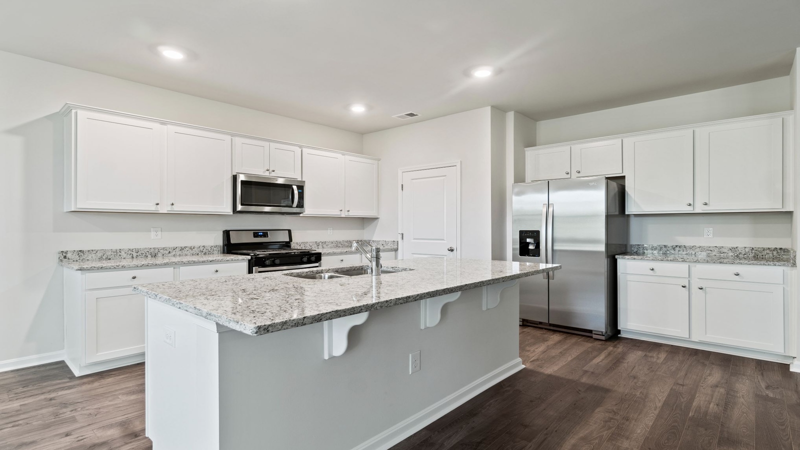 Spacious Kitchen island with seating, ideal daily living and prep zones, dining and hosting in our Fresh Modern Design