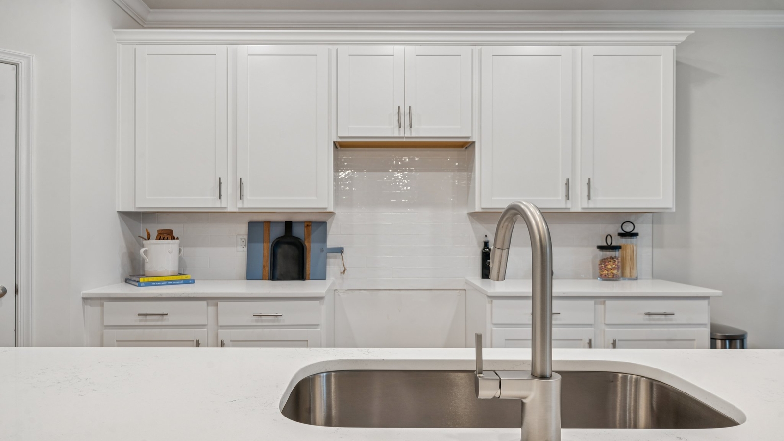 Riverview Landing's Kitchen island includes a seamless design with dining-living areas in an Open Concept plan