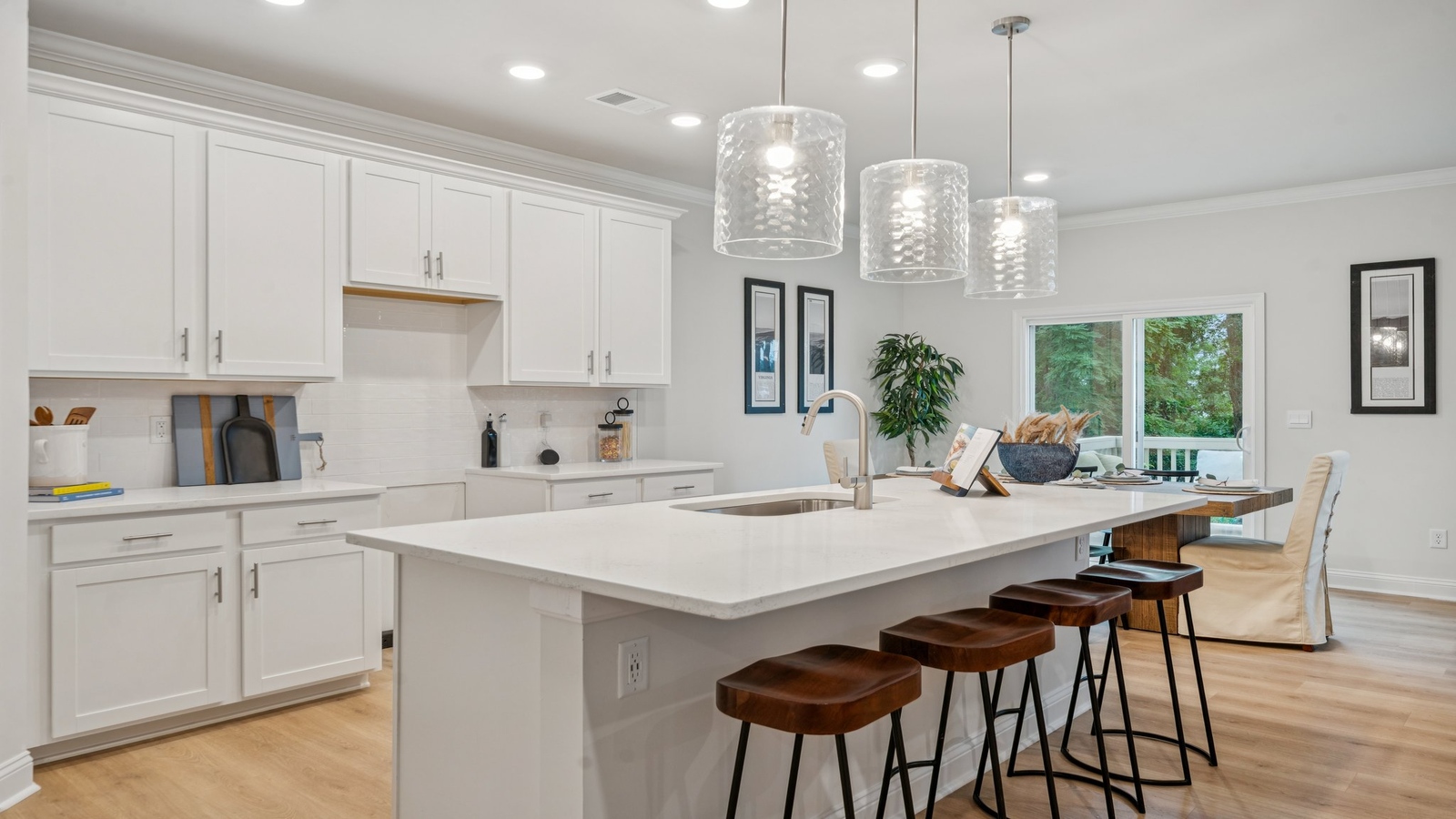 Functional kitchen island with ample storage options including a pantry, and New appliances, prep zones