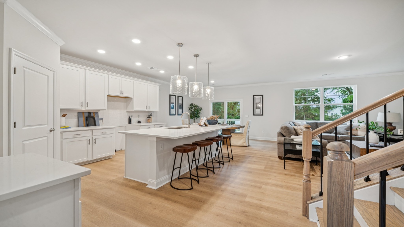New Home kitchen island with bar seating, ample storage and pantry, New Appliance Suite and meal prep zones