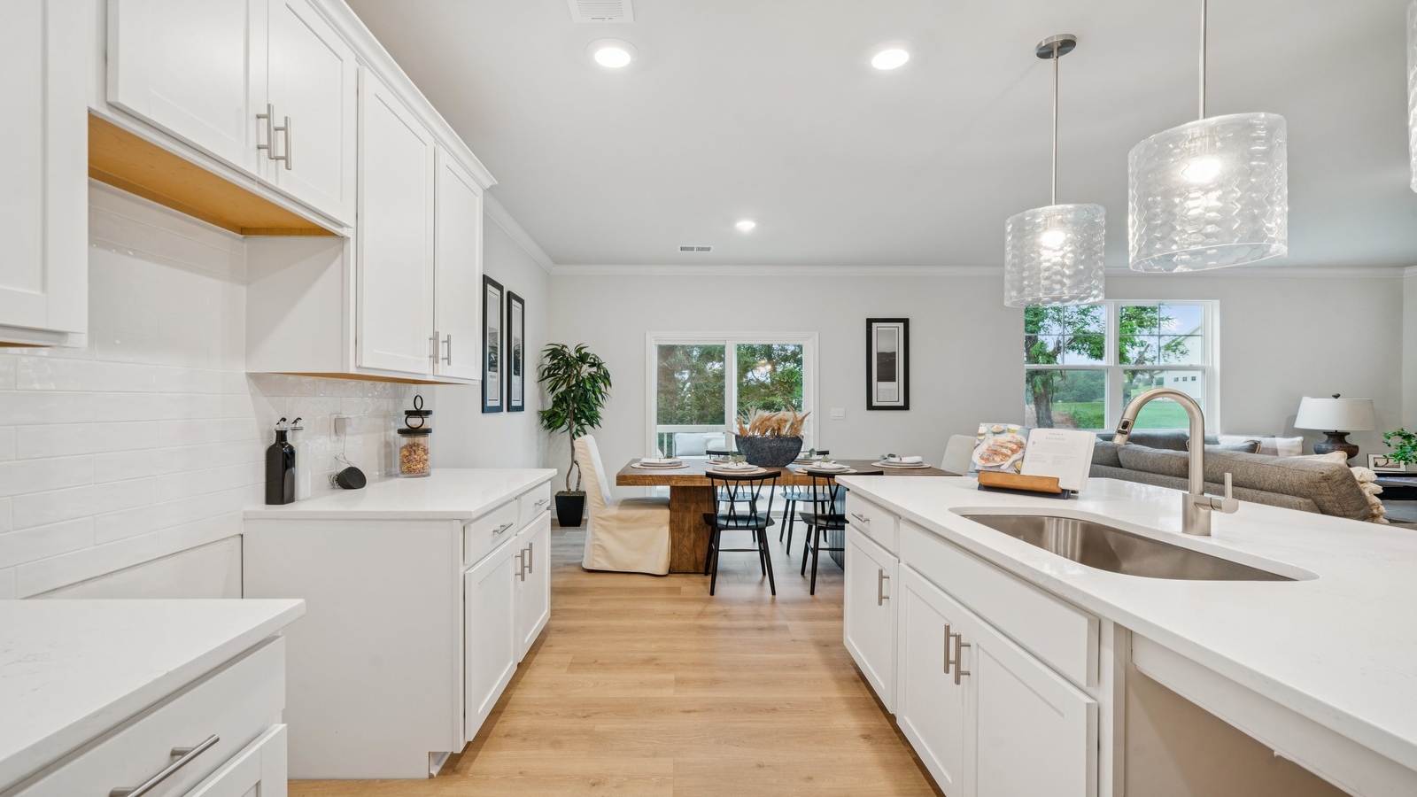 New Home kitchen with island-centric design, New appliance suite, seating, pantry, connectivity to the home