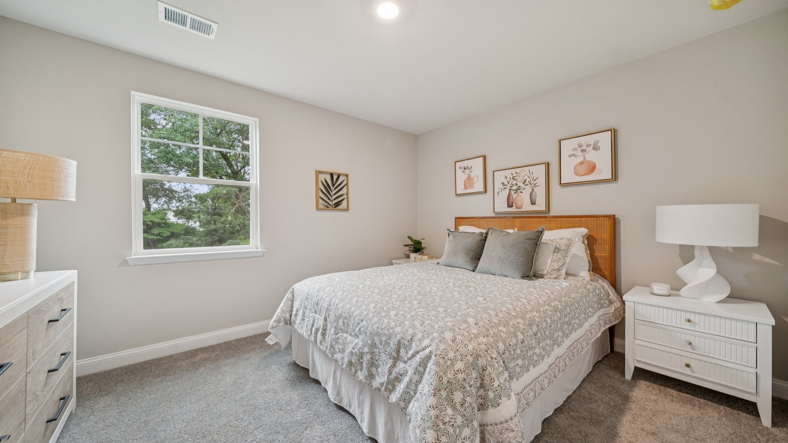Secondary Bedroom showcases space via single door closet, window, convenient home access Riverview Landing